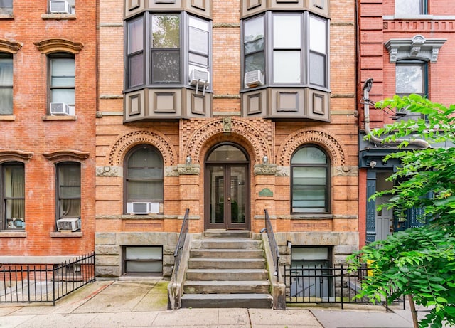 294 Barrow St Unit 6, Jersey City, NJ 07302 - view of front of home featuring french doors, brick siding, and cooling unit
