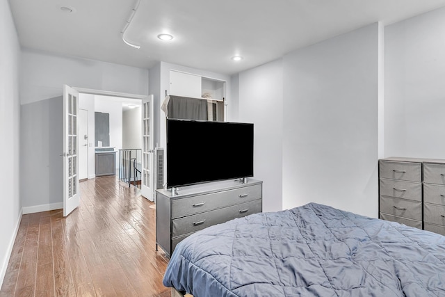 294 Barrow St Unit 6, Jersey City, NJ 07302 - bedroom with hardwood / wood-style floors and recessed lighting