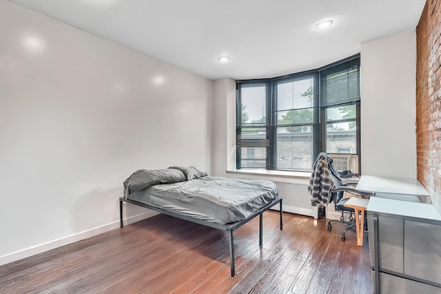 294 Barrow St Unit 6, Jersey City, NJ 07302 - bedroom with wood finished floors, cooling unit, and recessed lighting