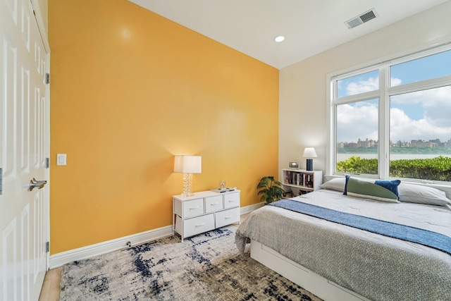 7400 River Rd Unit 114, North Bergen, NJ 07047 - bedroom with wood finished floors and recessed lighting