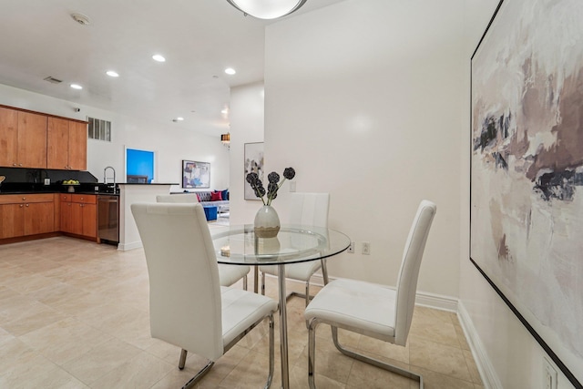 7400 River Rd Unit 114, North Bergen, NJ 07047 - dining area with recessed lighting and baseboards