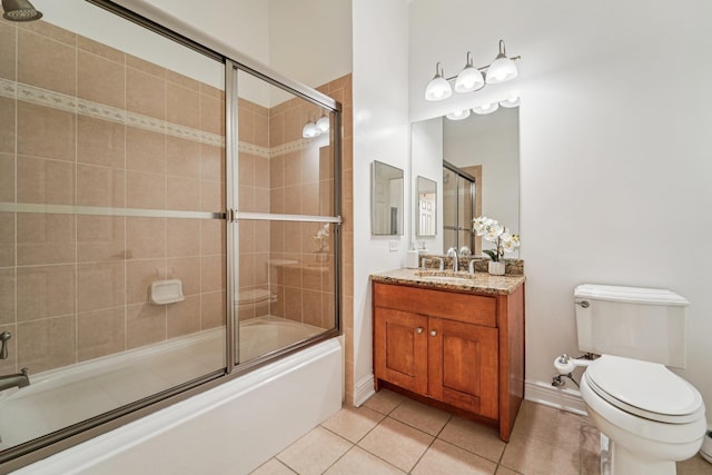 7400 River Rd Unit 114, North Bergen, NJ 07047 - bathroom featuring tile patterned flooring, bath / shower combo with glass door, and vanity