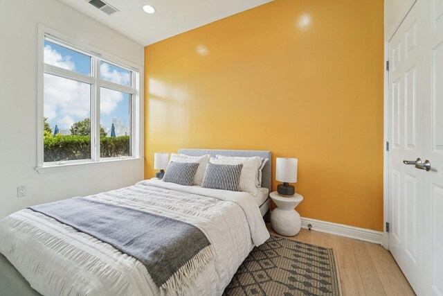 7400 River Rd Unit 114, North Bergen, NJ 07047 - bedroom featuring wood finished floors and recessed lighting