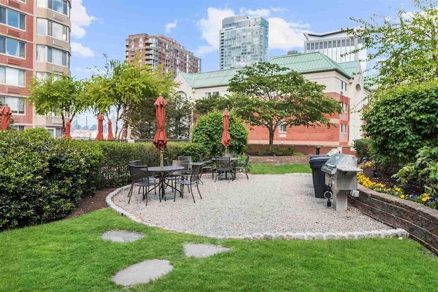 exterior space with a patio area and a yard