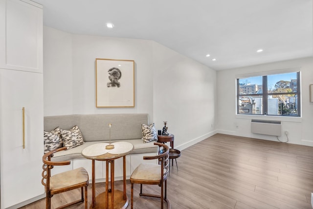 sitting room with recessed lighting, light wood-type flooring, and baseboards