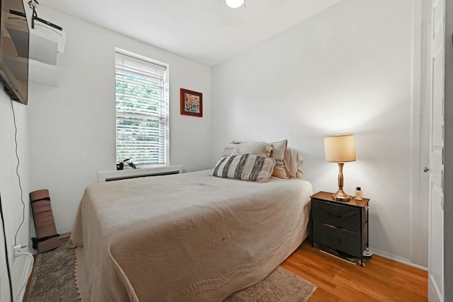 734 Adams St Unit 4B, Hoboken, NJ 07030 - bedroom with wood finished floors and baseboards