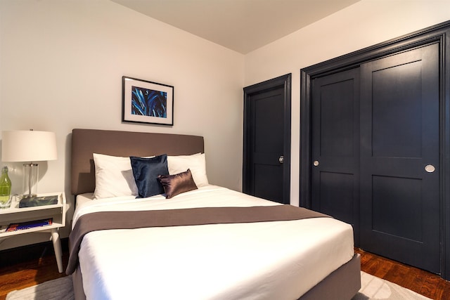 bedroom featuring dark hardwood / wood-style floors