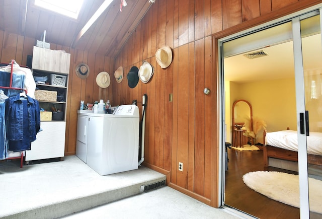 87 Stony Ridge Dr, Hillsdale, NJ 07642 - clothes washing area with wooden walls, laundry area, and washer / dryer