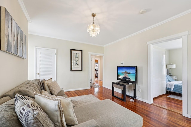 5 77th St, North Bergen, NJ 07047 - living area featuring crown molding, dark wood-type flooring, and a chandelier