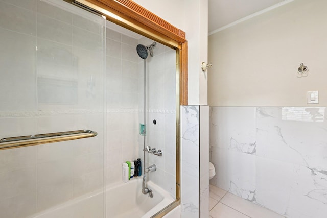 5 77th St, North Bergen, NJ 07047 - bathroom featuring tub / shower combination, crown molding, and tile walls