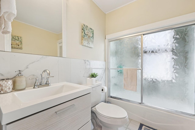 5 77th St, North Bergen, NJ 07047 - bathroom featuring vanity, shower / bath combination with glass door, crown molding, tile walls, and tile patterned flooring