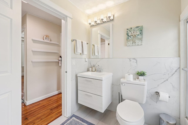 5 77th St, North Bergen, NJ 07047 - bathroom featuring vanity, tile walls, and wood finished floors