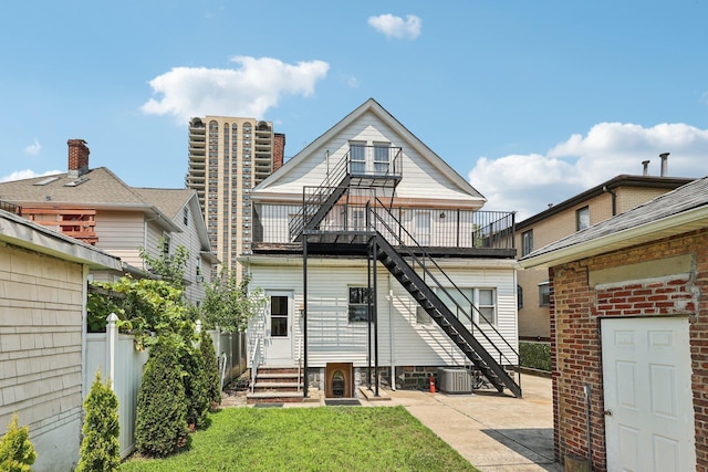 5 77th St, North Bergen, NJ 07047 - back of house featuring stairs, entry steps, and a patio area