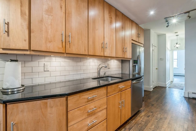 297 Pavonia Ave Unit 2A, Jersey City, NJ 07302 - kitchen with a sink, stainless steel dishwasher, dark wood-type flooring, baseboards, and tasteful backsplash