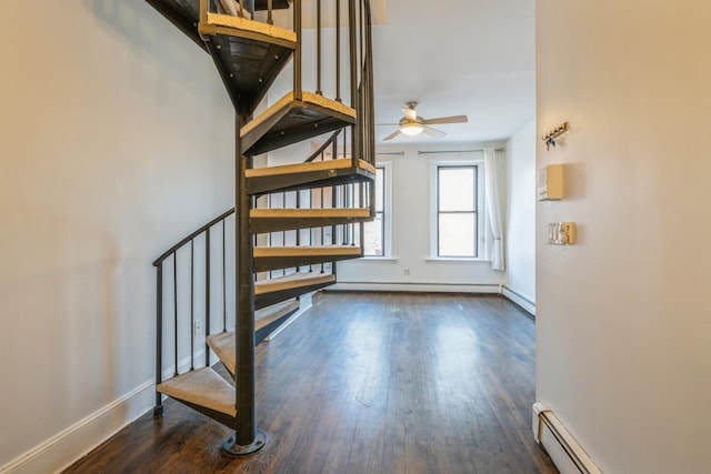 297 Pavonia Ave Unit 2A, Jersey City, NJ 07302 - stairway with a baseboard radiator, wood finished floors, a ceiling fan, baseboards, and baseboard heating