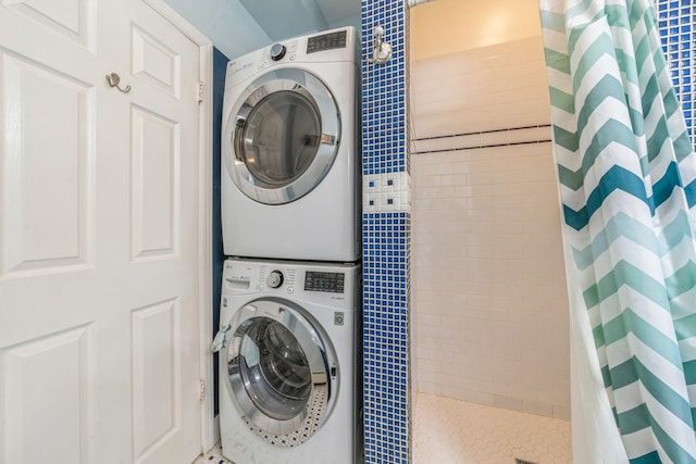 297 Pavonia Ave Unit 2A, Jersey City, NJ 07302 - washroom with stacked washing machine and dryer