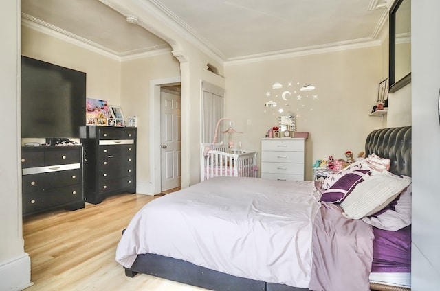 400 67th St, West New York, NJ 07093 - bedroom with crown molding and wood finished floors
