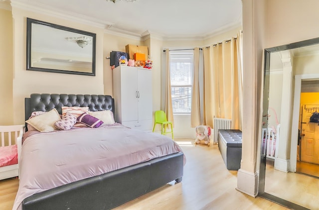 400 67th St, West New York, NJ 07093 - bedroom with wood finished floors and ornamental molding