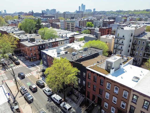 drone / aerial view with a city view