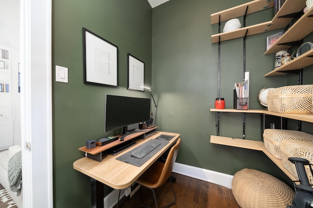 office area with baseboards and wood finished floors