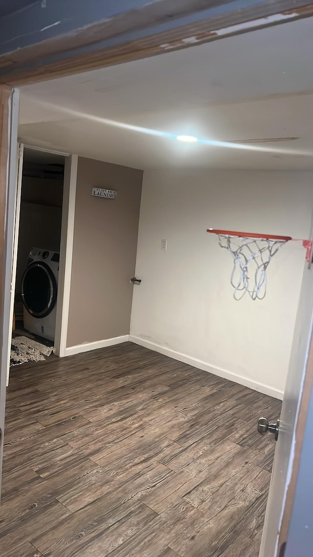 440 Park Ave, Paterson, NJ 07504 - unfurnished room with washer / clothes dryer, dark wood-style flooring, and baseboards