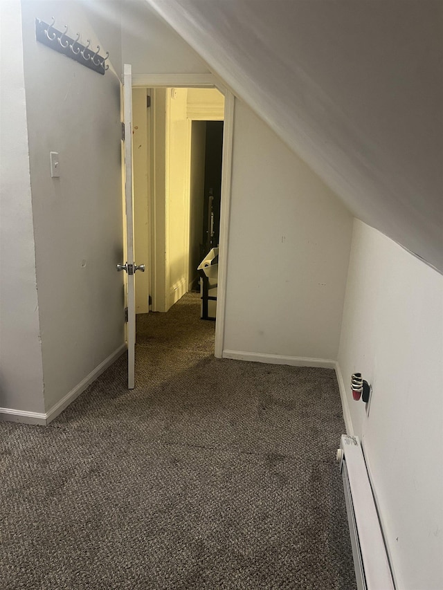 440 Park Ave, Paterson, NJ 07504 - bonus room featuring lofted ceiling, a baseboard heating unit, carpet flooring, and baseboards