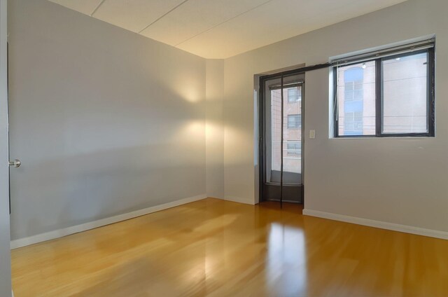 463 1st St Unit 3B, Hoboken, NJ 07030 - spare room featuring wood finished floors and baseboards