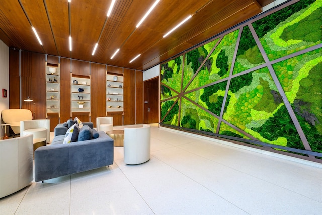 160 1st St Unit 1013, Jersey City, NJ 07302 - living room featuring wooden ceiling and speckle patterned floor