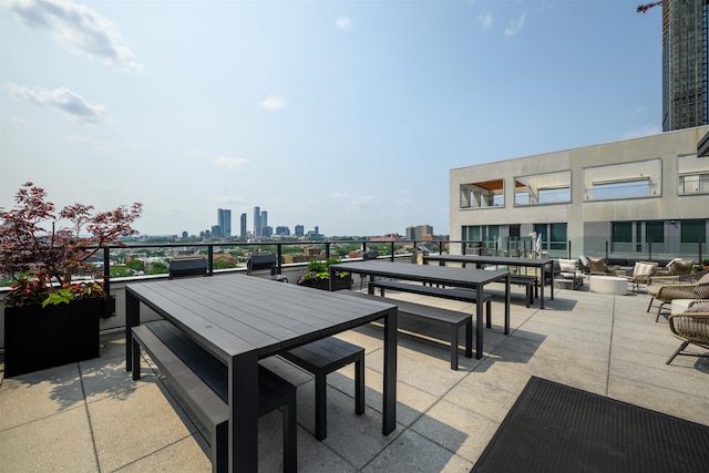 160 1st St Unit 1013, Jersey City, NJ 07302 - patio / terrace featuring outdoor dining area, a skyline view, and an outdoor hangout area