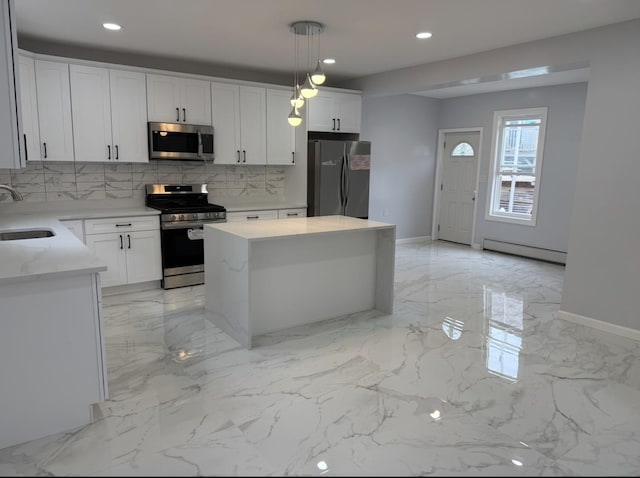 187 Lembeck Ave, Jersey City, NJ 07305 - kitchen with appliances with stainless steel finishes, decorative backsplash, recessed lighting, a baseboard radiator, and light marble finish floors