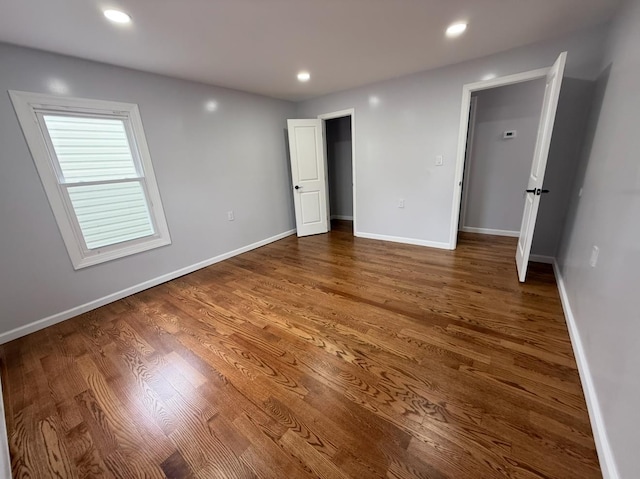187 Lembeck Ave, Jersey City, NJ 07305 - unfurnished bedroom with wood finished floors and recessed lighting