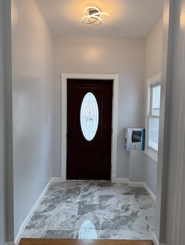 187 Lembeck Ave, Jersey City, NJ 07305 - entrance foyer with marble look tiles and baseboards