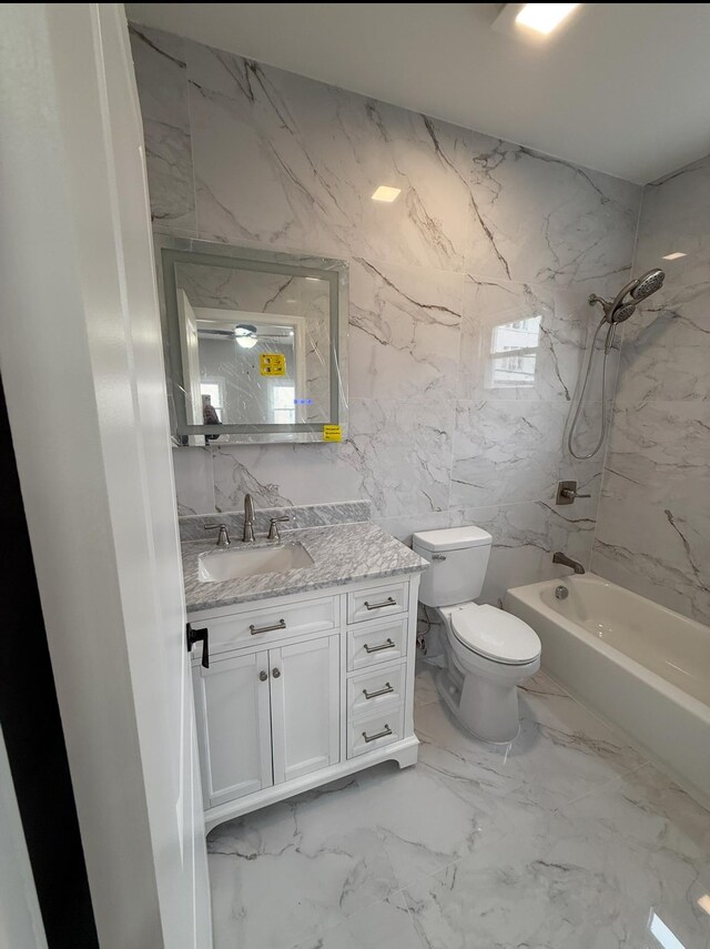 187 Lembeck Ave, Jersey City, NJ 07305 - bathroom with vanity, washtub / shower combination, and marble finish flooring