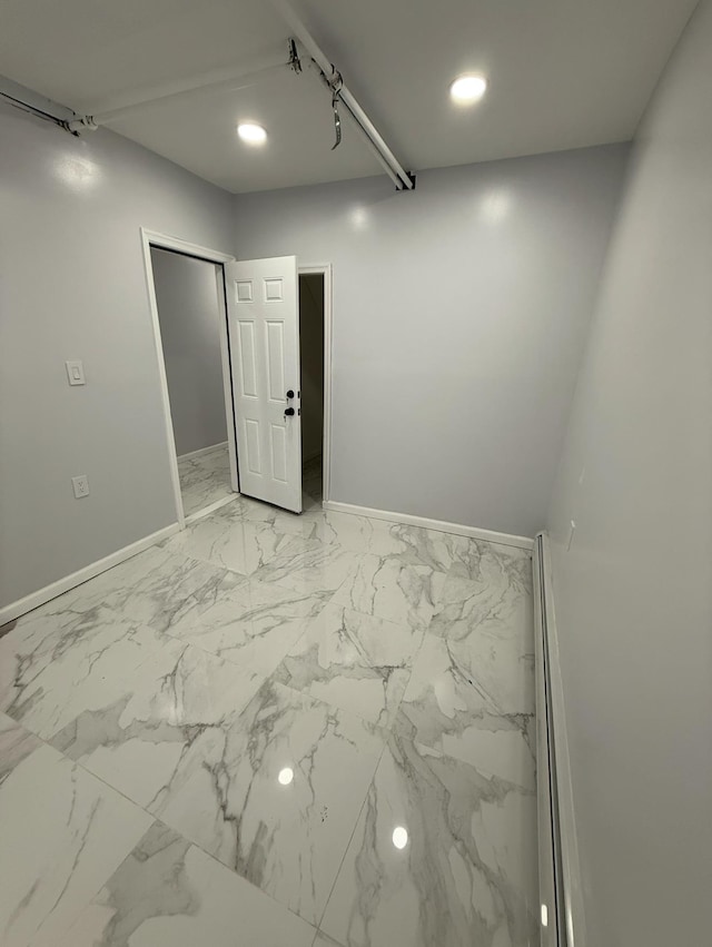 187 Lembeck Ave, Jersey City, NJ 07305 - spare room with light marble finish flooring and recessed lighting