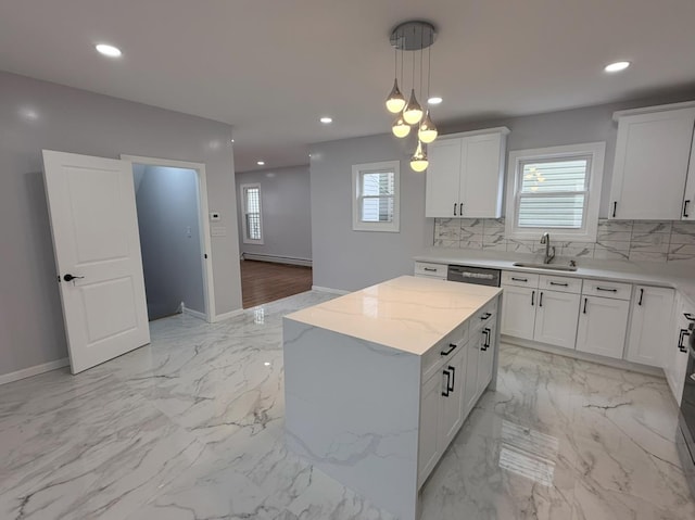 187 Lembeck Ave, Jersey City, NJ 07305 - kitchen featuring plenty of natural light, decorative light fixtures, tasteful backsplash, white cabinets, and recessed lighting
