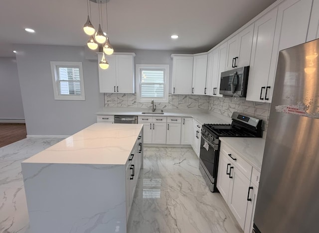 187 Lembeck Ave, Jersey City, NJ 07305 - kitchen with stainless steel appliances, a baseboard radiator, tasteful backsplash, healthy amount of natural light, and recessed lighting
