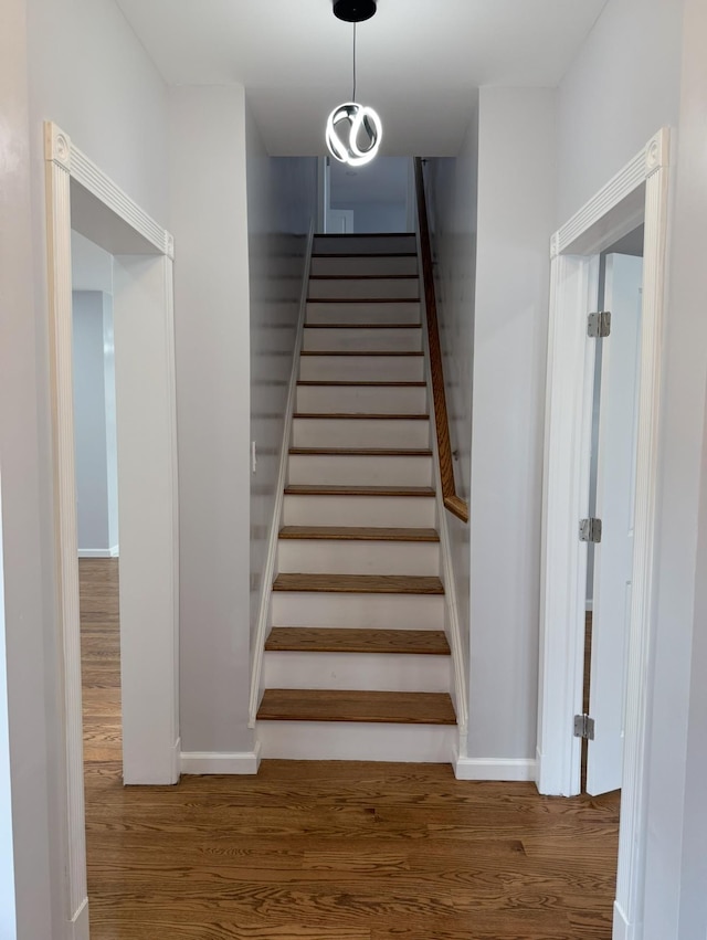 187 Lembeck Ave, Jersey City, NJ 07305 - stairway with wood finished floors and baseboards