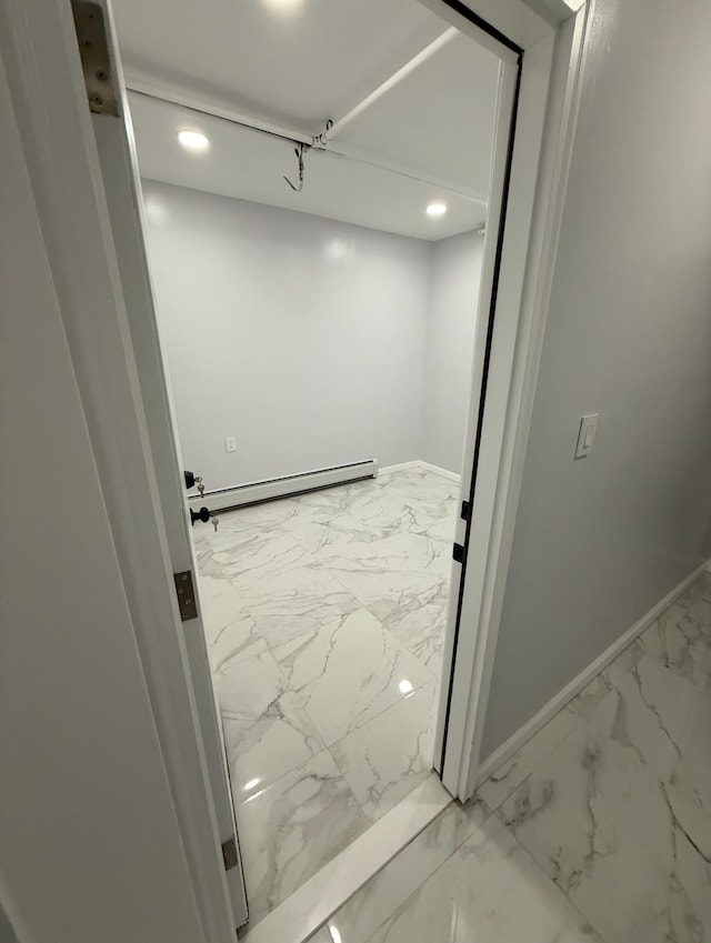 187 Lembeck Ave, Jersey City, NJ 07305 - bathroom featuring marble finish flooring, a baseboard radiator, and recessed lighting
