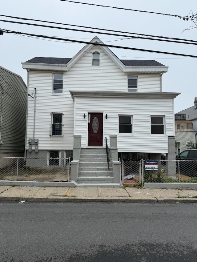 187 Lembeck Ave, Jersey City, NJ 07305 - view of front of home featuring a fenced front yard, a gate, and entry steps