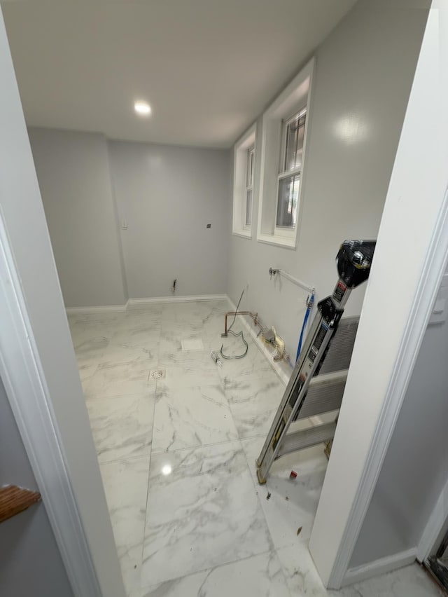 187 Lembeck Ave, Jersey City, NJ 07305 - basement featuring marble look tile flooring and recessed lighting