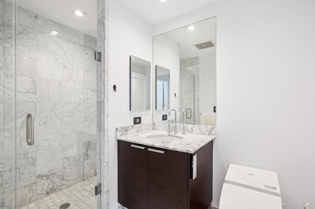 8100 River Rd Unit 1101, North Bergen, NJ 07047 - bathroom with vanity, a shower stall, and visible vents