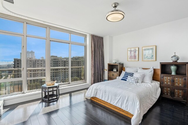8100 River Rd Unit 1101, North Bergen, NJ 07047 - bedroom with dark wood finished floors and a city view