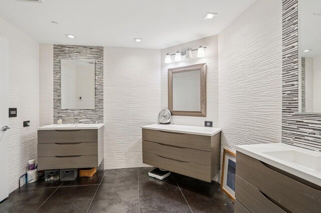8100 River Rd Unit 1101, North Bergen, NJ 07047 - full bath with tile patterned flooring, tile walls, two vanities, and tasteful backsplash
