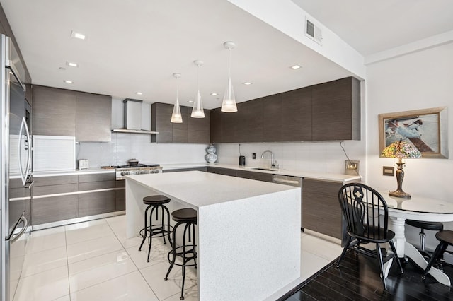 8100 River Rd Unit 1101, North Bergen, NJ 07047 - kitchen featuring modern cabinets, visible vents, a sink, a kitchen bar, and wall chimney range hood