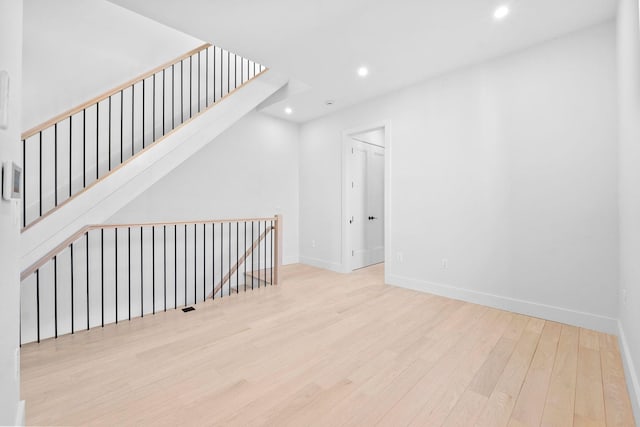 spare room with light wood-type flooring