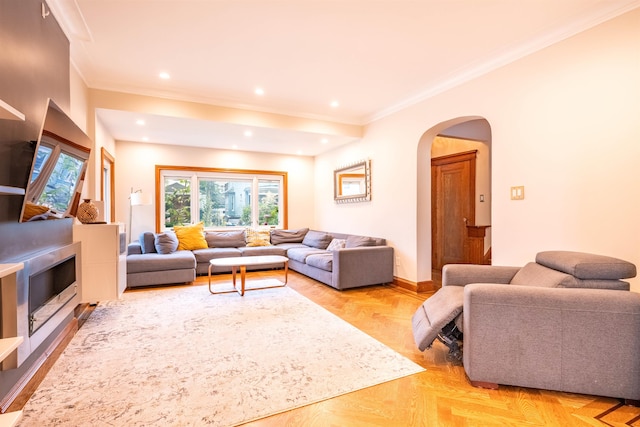 living room featuring light parquet floors and crown molding