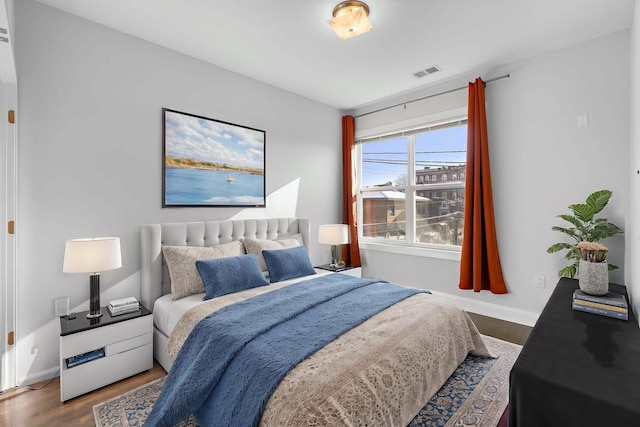 bedroom featuring dark wood-type flooring