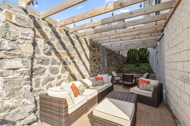 view of patio featuring a pergola and outdoor lounge area