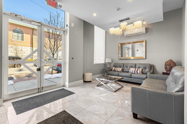 living room featuring an AC wall unit, light tile patterned floors, a chandelier, and french doors