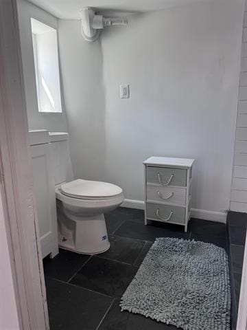 bathroom featuring toilet